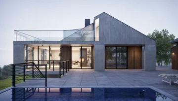 Modern concrete villa with infinity pool, glass walls, and illuminated interior at twilight