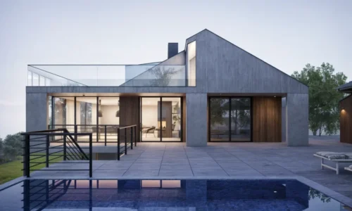 Modern concrete villa with infinity pool, glass walls, and illuminated interior at twilight